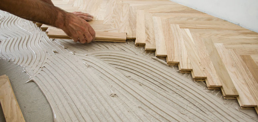 Montaż podłogi drewnianej  - jodełki na klej - Kluczbork